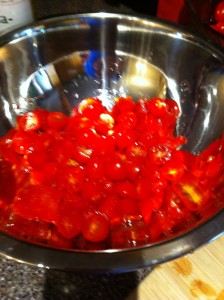 Seasoning the yummy tomatoes from the garden